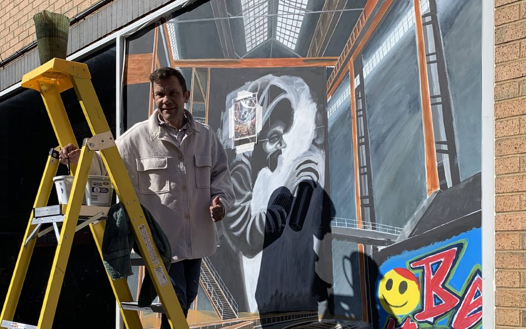 Last Chance to See the Mural Artist at Work